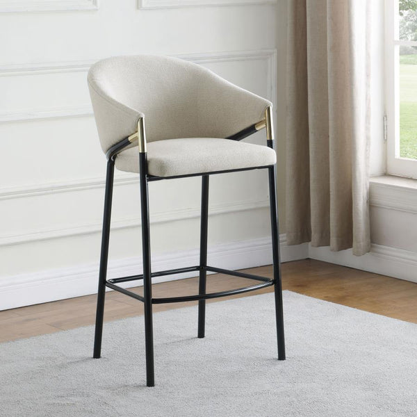  the legs come in a glossy black finish that lends to many color palettes and offers a handsome look. Each stool has a cushioned seat