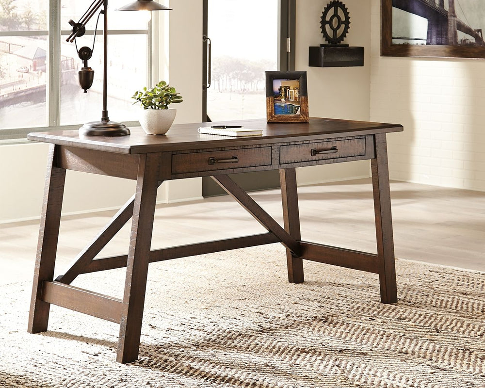 Leaning toward a casually cool look with a touch of rustic industrial flair? This home office desk with canted legs takes a fresh stance on style. Two smooth-gliding drawers with dovetail construction reflect high quality that never goes out of fashion. S