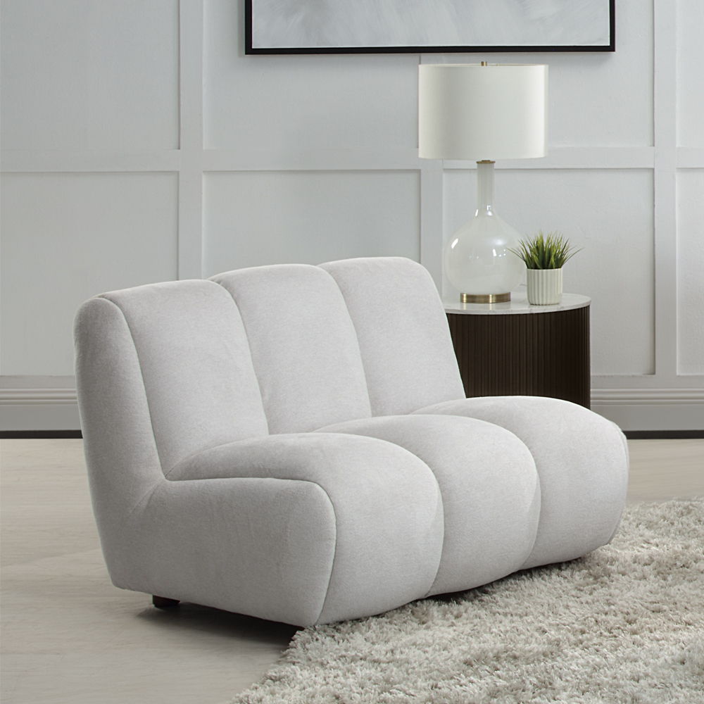 Manilla - Chair - White<br/><br/><b>Product Features</b><ul><li>Seat Construction: Pocket Coil</li><li>Wooden Inner Frame</li><li>Tight Seat & Back Cushion</li><li>Channel Tufted</li><li>Accent Pillows Included</li></ul><br/>