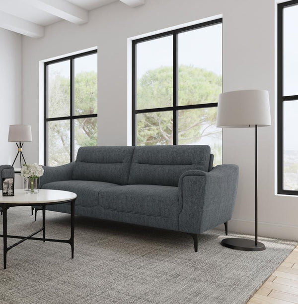  while plush pocket coil seat cushions and modern track arms provide inviting support for your downtime. Designed with