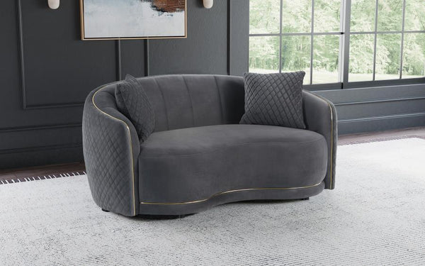  the loveseat is a chic curved kidney silhouette with tight upholstery over its seat and a channel tufted back. The outer back and arm s