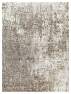 This area rug features a cloudy abstract pattern of ivory, beige, brown and shades of gray. Plush pile is loaded with fun, feel-good texture. Harmonious hues make it a tasteful choice for so many spaces.<br/><br/><b>Product Features</b><ul><li>Made of pol