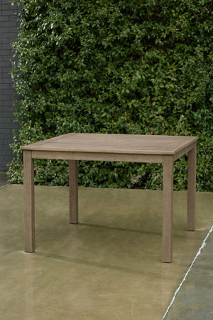  this dining table brings a casually cool feel to your outdoor space. The neutral brown hue of the piece easily pairs with your current porch or deck decor. An umbrella hole lets you decide whether to add an umbrella on sunny days.<br>