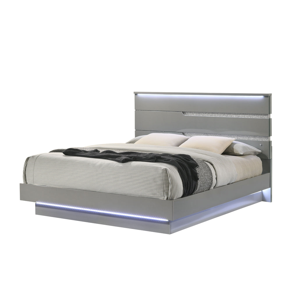 The Paradox Bed in Gray redefines contemporary elegance with its gleaming Gray gloss laminate finish that offers both a sleek look and practical benefits such as scratch and water resistance. This bed includes a headboard, footboard, side rails, and a bed