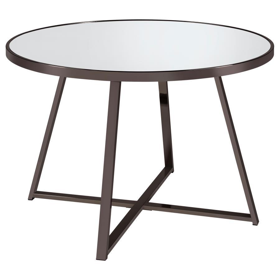 Gather for delicious meals with your favorite people in chic style with this contemporary dining table. The round table epitomizes modern minimalist design principles while adding decorative flair with subtle geometric touches in its angular, open frame s