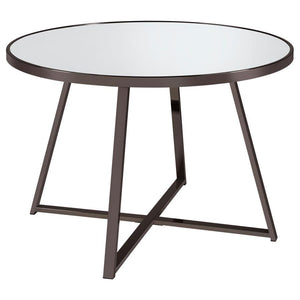 Gather for delicious meals with your favorite people in chic style with this contemporary dining table. The round table epitomizes modern minimalist design principles while adding decorative flair with subtle geometric touches in its angular, open frame s