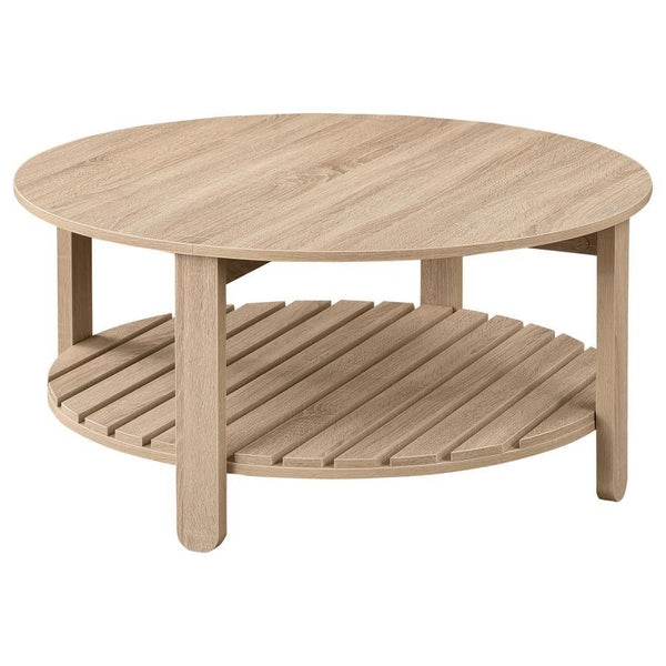 This round coffee table combines modern farmhouse charm with practical functionality. Made from engineered wood with an eco-friendly, scratch-resistant laminate veneer, it features a natural finish and subtle wood grain texture. The round tabletop offers 