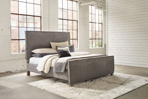  this king upholstered panel bed seamlessly fits in with existing modern decor. Its clean-lined profile and tailored slate gray upholstery give an urban sophistication. This chic bed also features a double