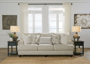  easygoing hue is enhanced by even lighter flax peeking through. Distinctive roll arms add a dab of debonair
