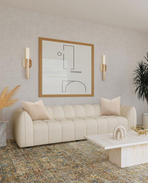  a perfect interior focal point with its fun bubble-like design. The sofa shows off boucle upholstery in a sand pebble hue