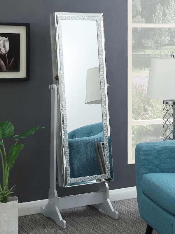 offering a beautiful silver finish to enliven any decor. The rectangular mirror features a lovely border sure to draw attention. R