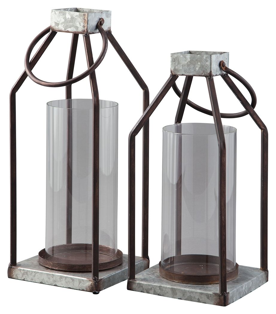 Whoever said you couldnâ€™t illuminate in style? This set of lanterns act as beautiful vessels for the romantic glow of pillar candles, whether placed in an indoor or outdoor space. The galvanized metal offers decor versatility, and the top metal handle a
