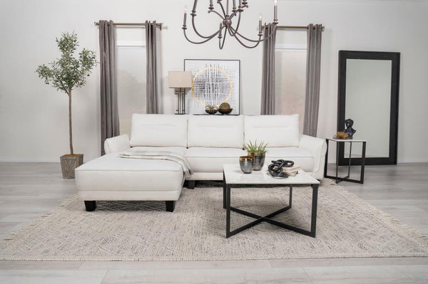  available in grey or white. The fuzzy teddy bear-like textured fabric upholstery creates a cozy atmosphere. The softly rounded arms and welt framed reversible back cushions add a touch of
