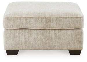  the plush upholstery and dark tri-block legs are a na