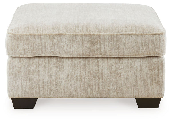  the plush upholstery and dark tri-block legs are a na