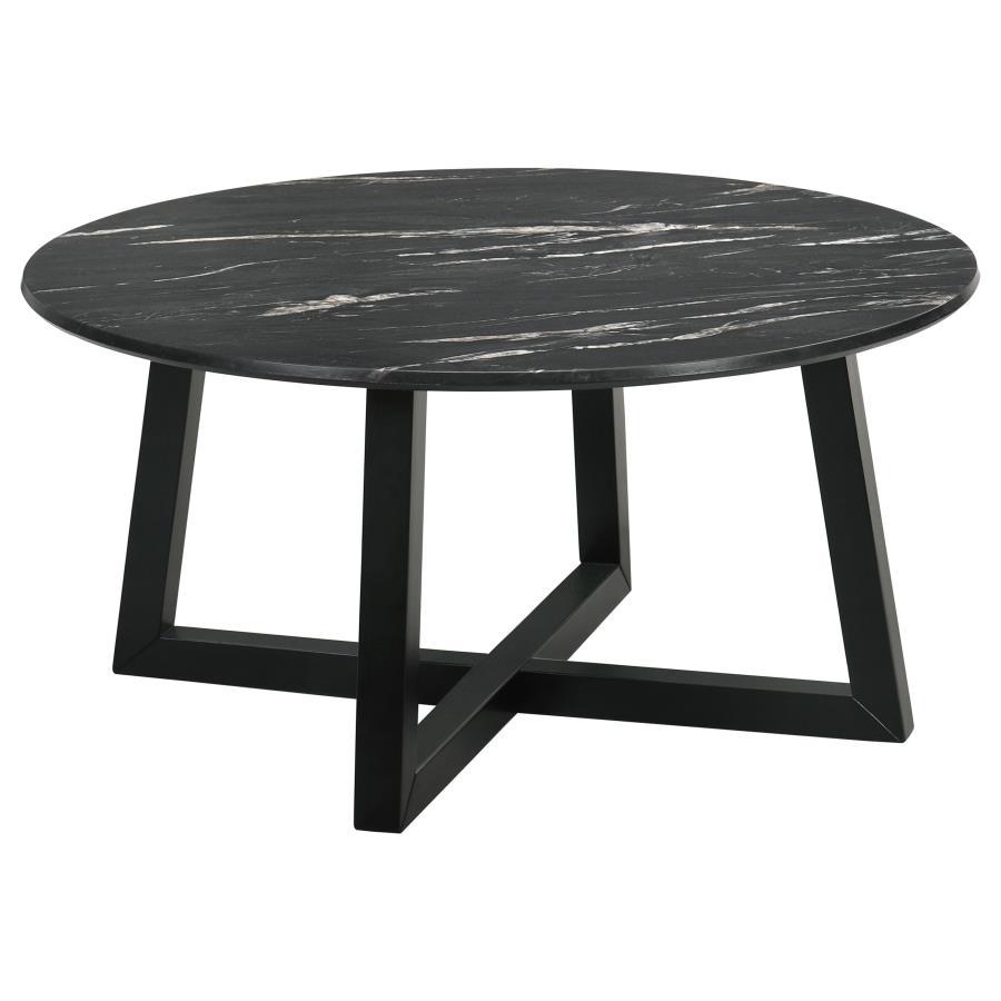 The coffee table stands as a centerpiece, its round form a canvas for the rich, decorative black faux marble that offers the beauty of natural stone with none of its fragility. The high-pressure laminate surface is a triumph of design, melding high durabi