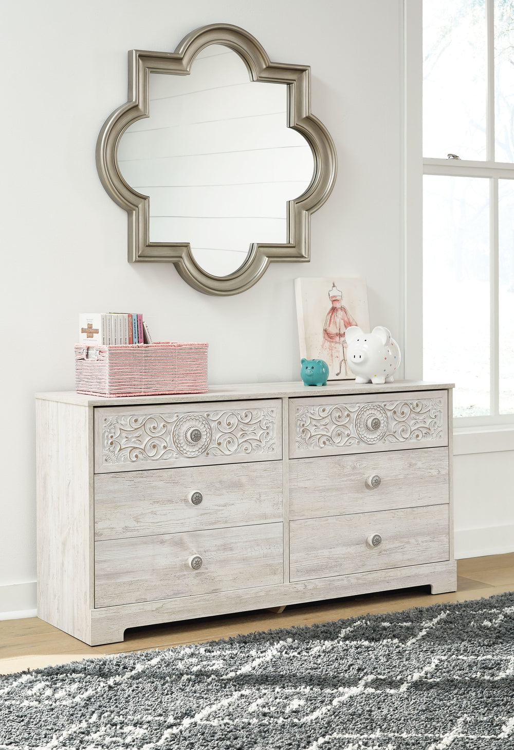 If it-'s coastal chic or cottage quaint style you long for, this whitewashed dresser invites you to go to town. Its distinctive weatherworn finish conveys an easy-breezy sensibility, perfect for a restful bedroom retreat. Tastefully edited lines and medal