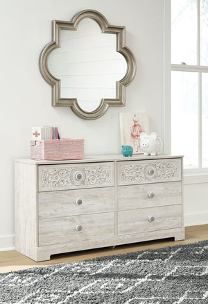  this whitewashed dresser invites you to go to town. Its distinctive weatherworn finish conveys an easy-breezy sensibility