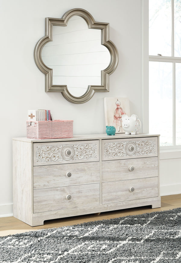  this whitewashed dresser invites you to go to town. Its distinctive weatherworn finish conveys an easy-breezy sensibility