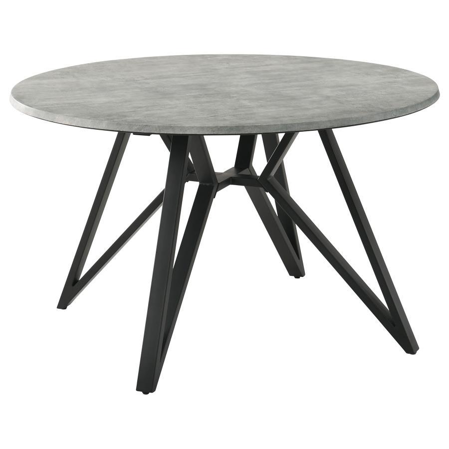 Elevate your modern industrial dining area with this retro-inspired round dining table. Designed with a high pressure laminate table top with a concrete-looking decoration paper, this dining table offers a raw, organic texture to the space. The spacious, 