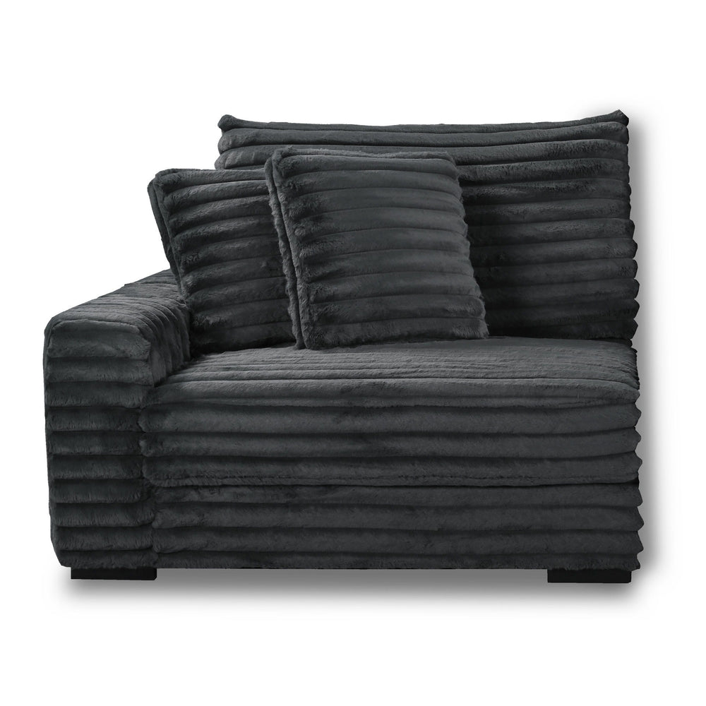 The Embrace Left Arm Facing Chair with 2 Accent Pillows in charcoal gray is a sophisticated and comfortable addition to your sectional arrangement. Featuring 100% charcoal gray polyester fabric with a fluffy, blanket-like texture, this chair promises ulti