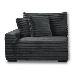 The Embrace Left Arm Facing Chair with 2 Accent Pillows in charcoal gray is a sophisticated and comfortable addition to your sectional arrangement. Featuring 100% charcoal gray polyester fabric with a fluffy, blanket-like texture, this chair promises ulti