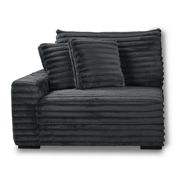 The Embrace Left Arm Facing Chair with 2 Accent Pillows in charcoal gray is a sophisticated and comfortable addition to your sectional arrangement. Featuring 100% charcoal gray polyester fabric with a fluffy, blanket-like texture, this chair promises ulti