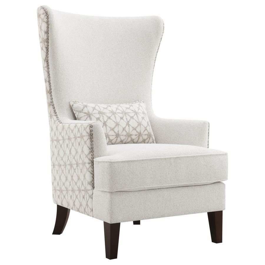 A haven for relaxation, this tasteful accent chair is also a source of inspired beauty, perfect for your semi-formal living area. Sit in supreme comfort on a chair with a frame built of various woods as artisan design elements include an ultra-high wing b