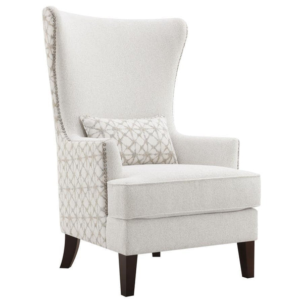 A haven for relaxation, this tasteful accent chair is also a source of inspired beauty, perfect for your semi-formal living area. Sit in supreme comfort on a chair with a frame built of various woods as artisan design elements include an ultra-high wing b