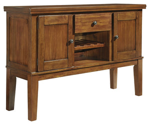 Have an appetite for clean-lined design, but with warmth and rustic character? Satisfaction is on the menu with this dining room server. We love how its gently distressed, burnished finish and plank-style accents incorporate depth and character. And its s