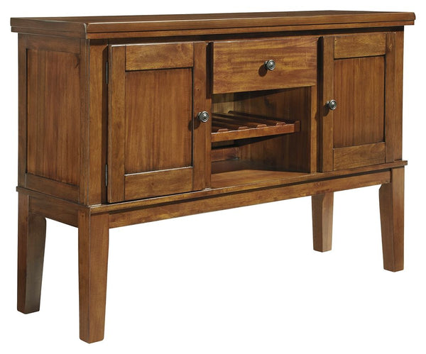Have an appetite for clean-lined design, but with warmth and rustic character? Satisfaction is on the menu with this dining room server. We love how its gently distressed, burnished finish and plank-style accents incorporate depth and character. And its s