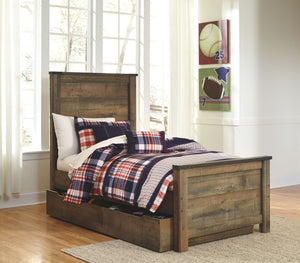 If you love country living, this twin panel bed with storage matches your authenticity. Rustic finish, plank-style details and nailhead trim pay homage to reclaimed barn wood, making for a chic look loaded with charm. Under bed storage unit includes two d