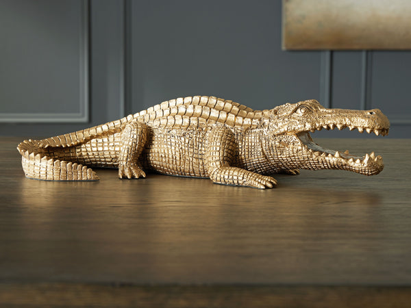  the alligator-shaped art piece is a snappy addition to your office or living room decor. Its remarkable attention to detail captures the animal-'s likeness in decidedl
