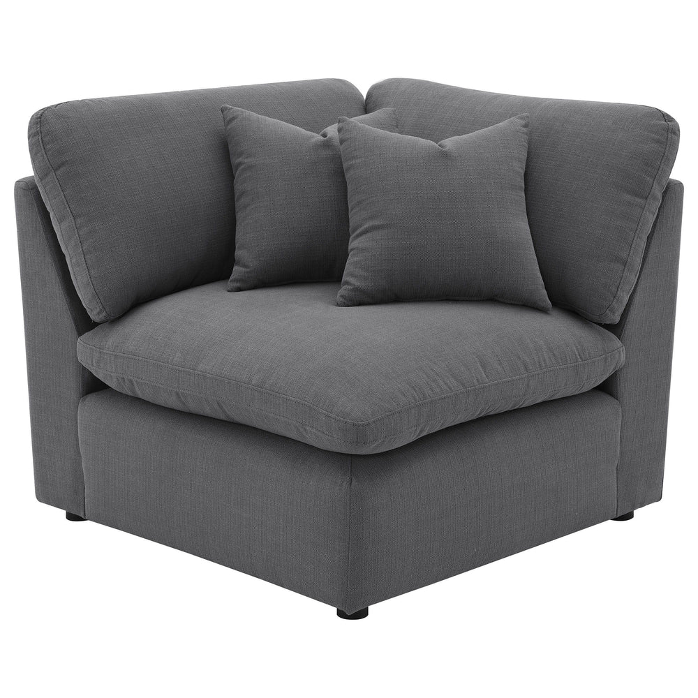 Complete your modular sectional with this versatile corner chair, designed to create a seamless transition between seating pieces. Upholstered in a sophisticated charcoal grey performance fabric, this chair offers plush comfort and a modern aesthetic that