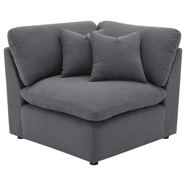 Complete your modular sectional with this versatile corner chair, designed to create a seamless transition between seating pieces. Upholstered in a sophisticated charcoal grey performance fabric, this chair offers plush comfort and a modern aesthetic that
