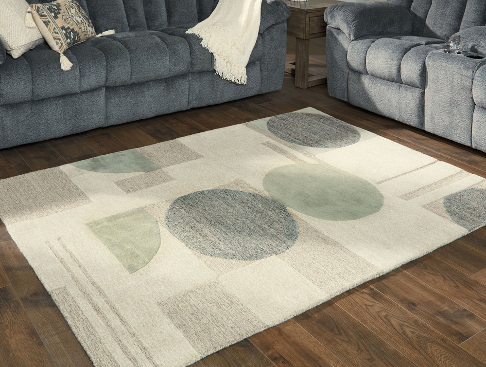 Low-key with high style. This hand-tufted area rug sports casually cool circles, a subtle palette and feel-good design. It-'s a relaxed sensibility that just worksâ€”anywhere and everywhere your floors are in need of a design refresh.<br/><br/><b>Product 