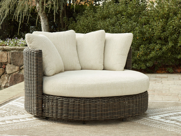  comfort and durability to alfresco fun. This outdoor swivel lounge chair captures the textural beauty of wicker while withstanding the elements