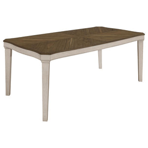 Transform your dining area into a cozy retreat with our modern farmhouse and coastal cottage dining table. The mindi veneer table top showcases a stunning starburst design, while the solid Asian hardwood legs provide sturdy support. The rustic cream finis