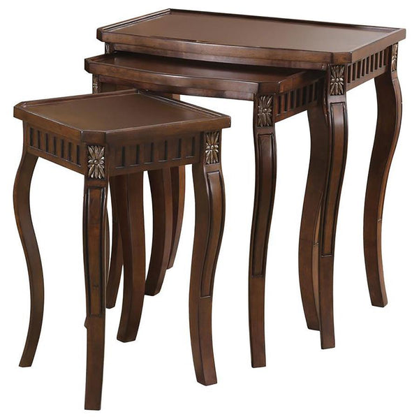 This three-piece nesting table set showcases an elegant design with beautiful detailing on the legs. The warm brown finish adds to its rich, traditional style, making it perfect for any living room space. The tables are crafted from durable engineered woo