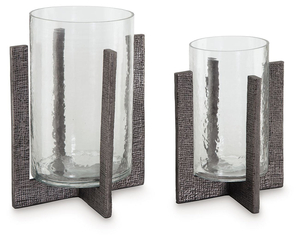 Top off tables and counters with this candle holder set. Searching for a casually cool ambient lighting option? These holders are pioneers in fashionable function, with the textured base acting as a beautiful support for flame-lit and electric candlelight
