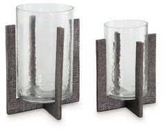 Top off tables and counters with this candle holder set. Searching for a casually cool ambient lighting option? These holders are pioneers in fashionable function, with the textured base acting as a beautiful support for flame-lit and electric candlelight