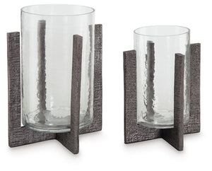 Top off tables and counters with this candle holder set. Searching for a casually cool ambient lighting option? These holders are pioneers in fashionable function, with the textured base acting as a beautiful support for flame-lit and electric candlelight