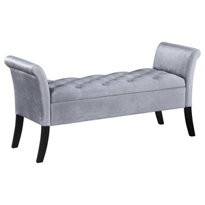 Elevate your living space with a harmonious blend of luxury and utility found in this exquisite storage bench. Adorned with a plush velvet upholstery, it boasts flared arms and meticulous button-tufting, reflecting a dedication to design and attention to 