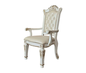 Commanding attention in any space, the impressive design of the Vendom double pedestal dining table will impress everyone. Adorned with classic elements including scrolls, curved shapes, and leaf molding accents to create an old-world charm. The antique p