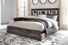 When merged in just the right way, rustic and industrial styles can make one happy marriage. Case in point: this king bookcase bed with storage. A refined take on barn board beauty, its complex, replicated wood grain showcases hints of burnt orange and te