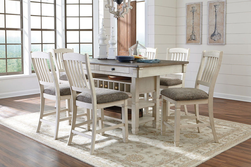 Unique two-tone finish with a combination of Oak and Acacia substrates combining a trendy textured antique white color with table and server tops finished in a textural weathered oak finish. Rectangular dining table features six convenient drawers for sto