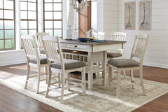 Unique two-tone finish with a combination of Oak and Acacia substrates combining a trendy textured antique white color with table and server tops finished in a textural weathered oak finish. Rectangular dining table features six convenient drawers for sto