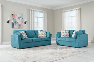 You want your home to reflect your modern, trendy eye for design. This seating package is here to help. Bold, bright and beautiful, it adds a fashion-forward pop of color to your living room. Velvet-like upholstery and matching bolster pillows keep comfor