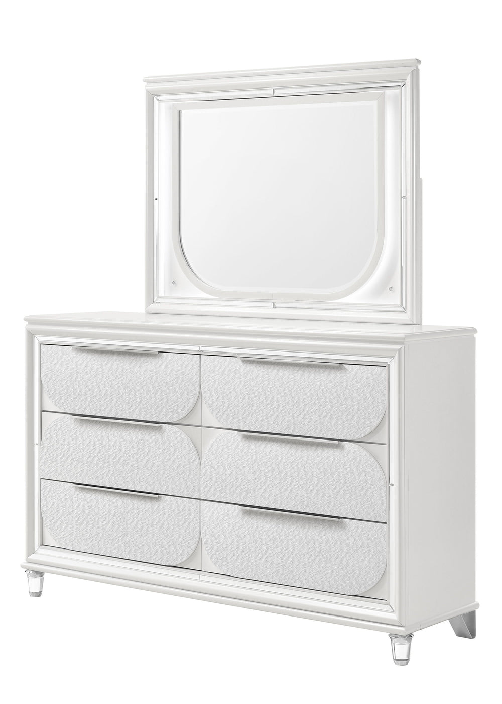 This bedroom set is a sophisticated fusion of modern design and luxurious comfort. Each piece boasts a bright white finish, accented with sleek mirrored trim that adds a touch of shine and refinement. The centerpiece is an opulent bed with an oversized he