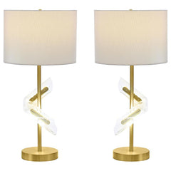 Designed to dazzle, this pair of gold table lamps features a clean drum shade paired with sculptural acrylic accents that wrap around the slender frame. A brilliant LED light glows from within the swirling acrylic, bringing dimension and ambient lighting 